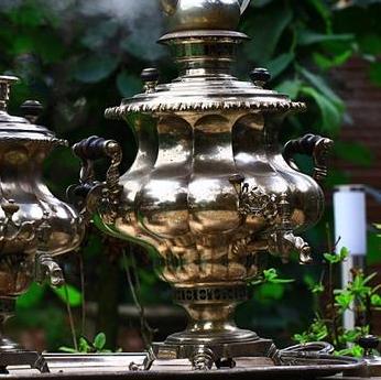 The device is a fire samovar on the wood 